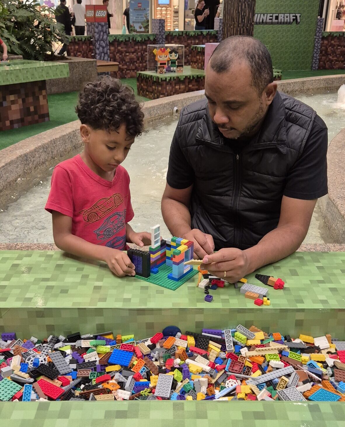 Gilson brincando com Heitor